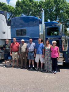 Vern Martin and his family next to truck in 2022.